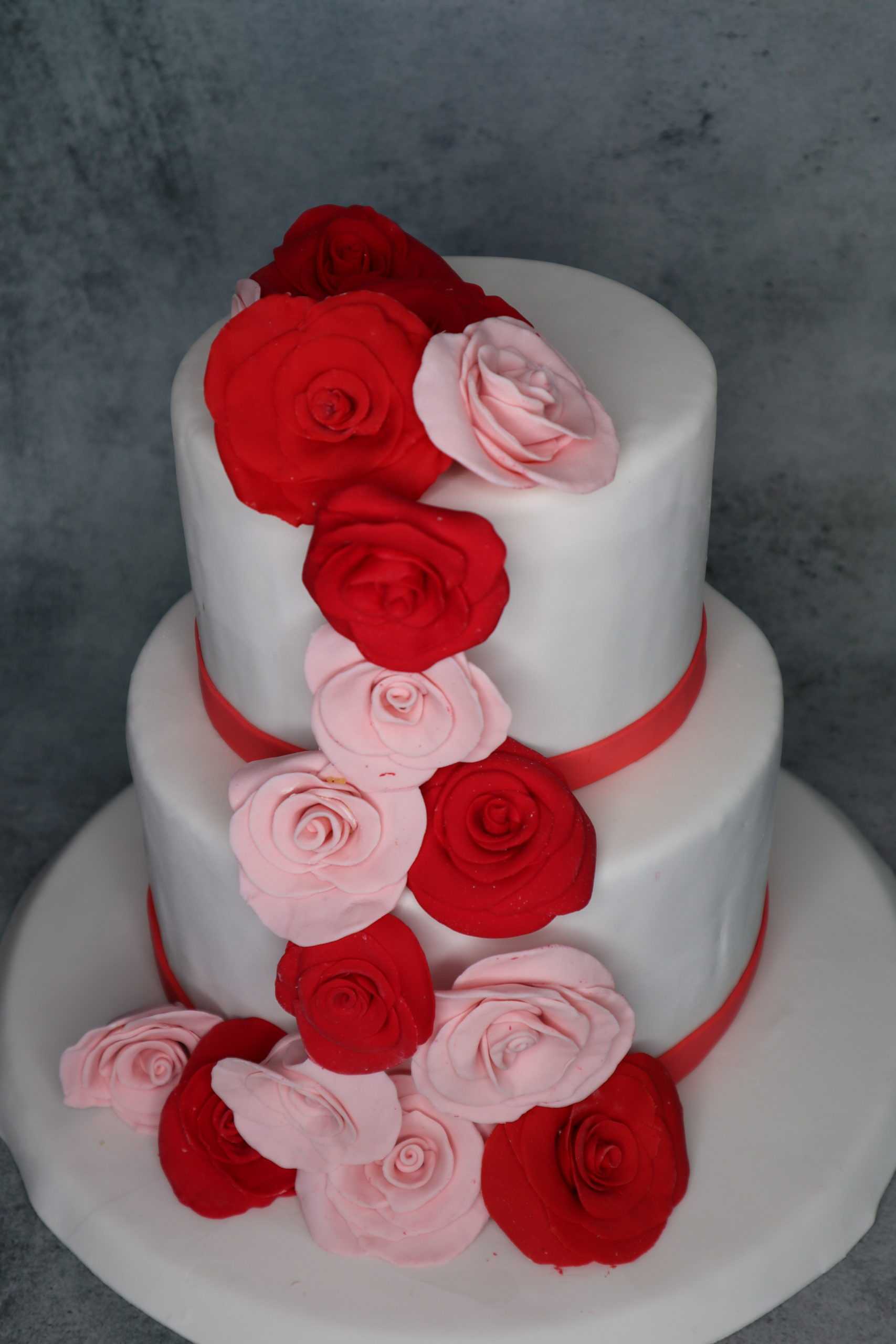 Order the best paradise three tier wedding cake from Gurgaon Bakers