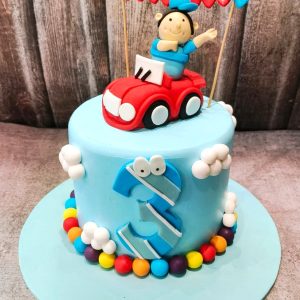 Car cake with kid