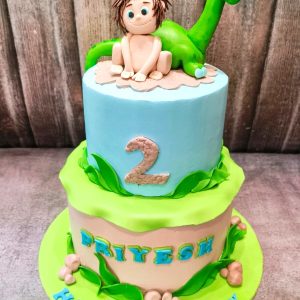 Baby with Dino cake