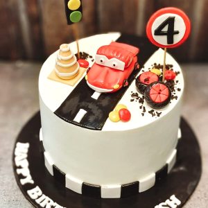 Car on road cake