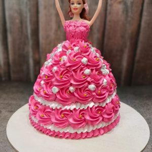 Pink barbie doll cake