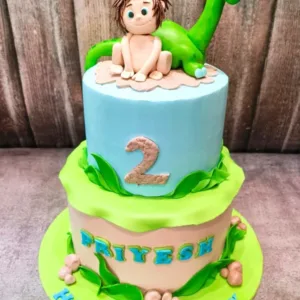 Baby with Dino cake